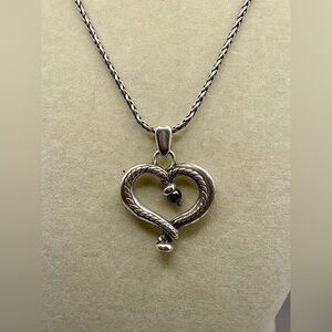 Vintage Brighton heart pendant with a black bead  on a silver tone chain.